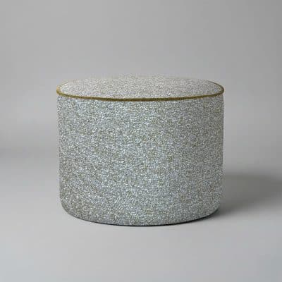Bespoke footstool in green and grey boucle fabric grey background