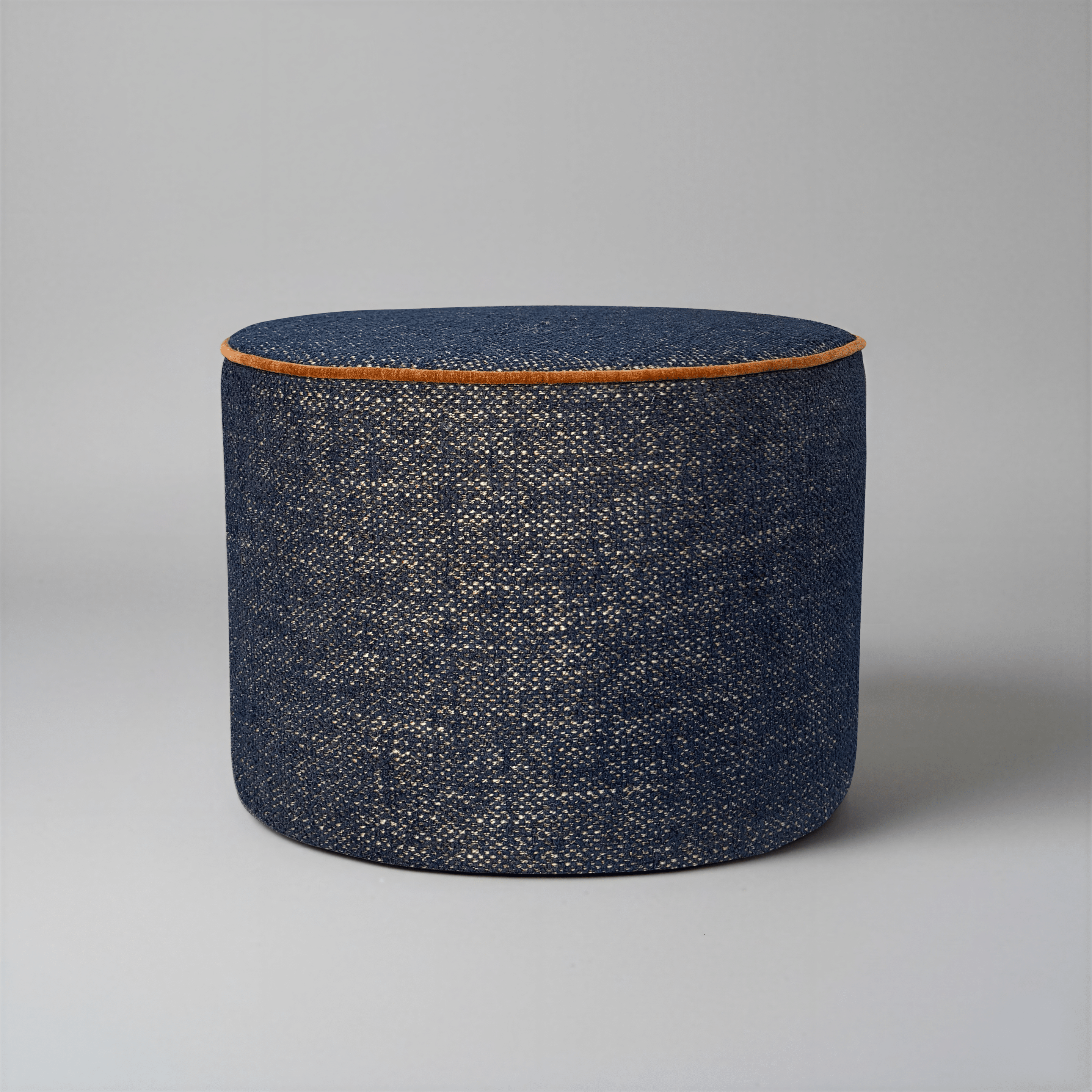 Funky in Speckled Navy Bespoke footstool in speckled navy tweed fabric on grey background