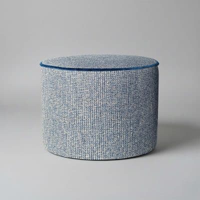 Bespoke footstool in blue weave fabric on grey background