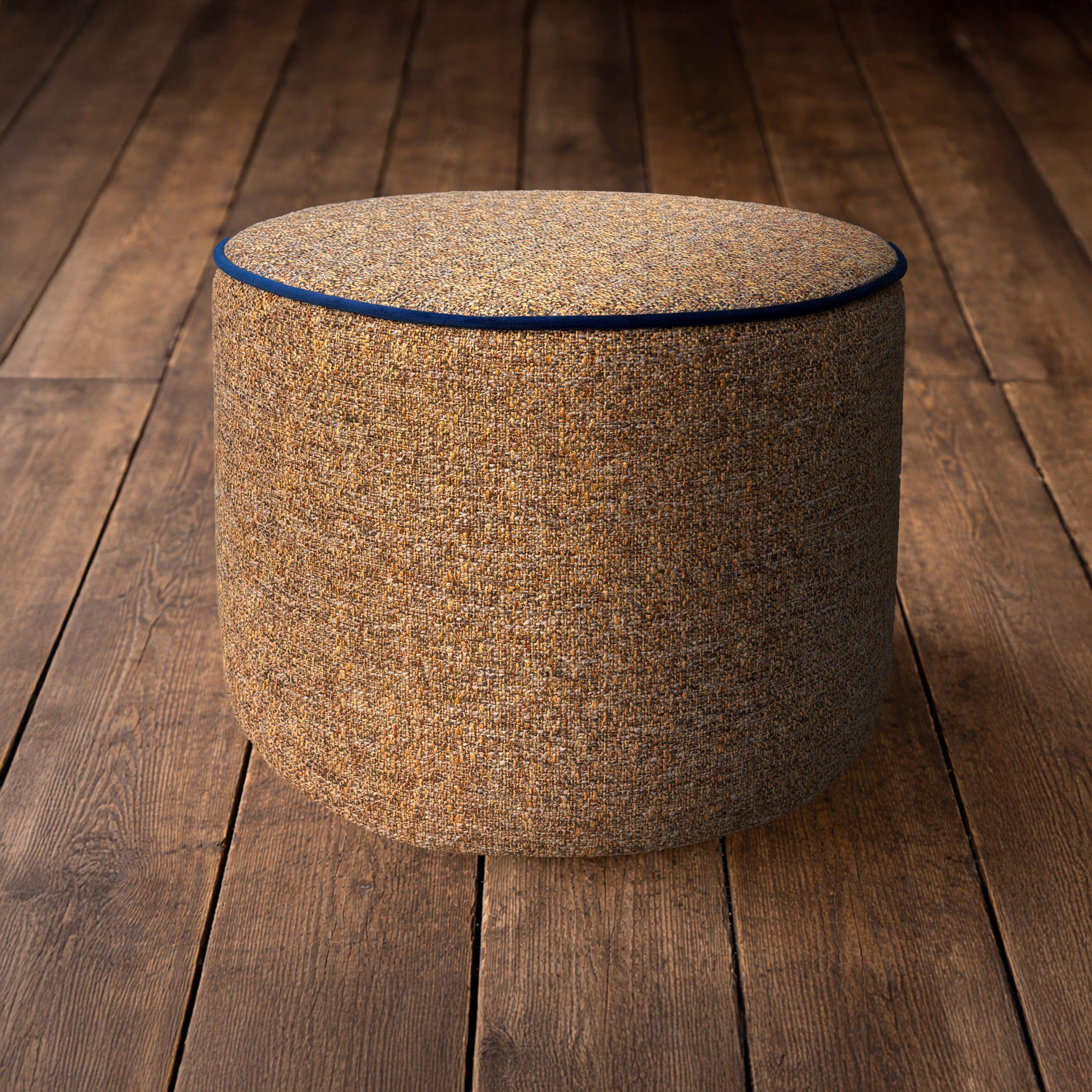 Ochre Linen Funky Ochre linen stool on floorboards