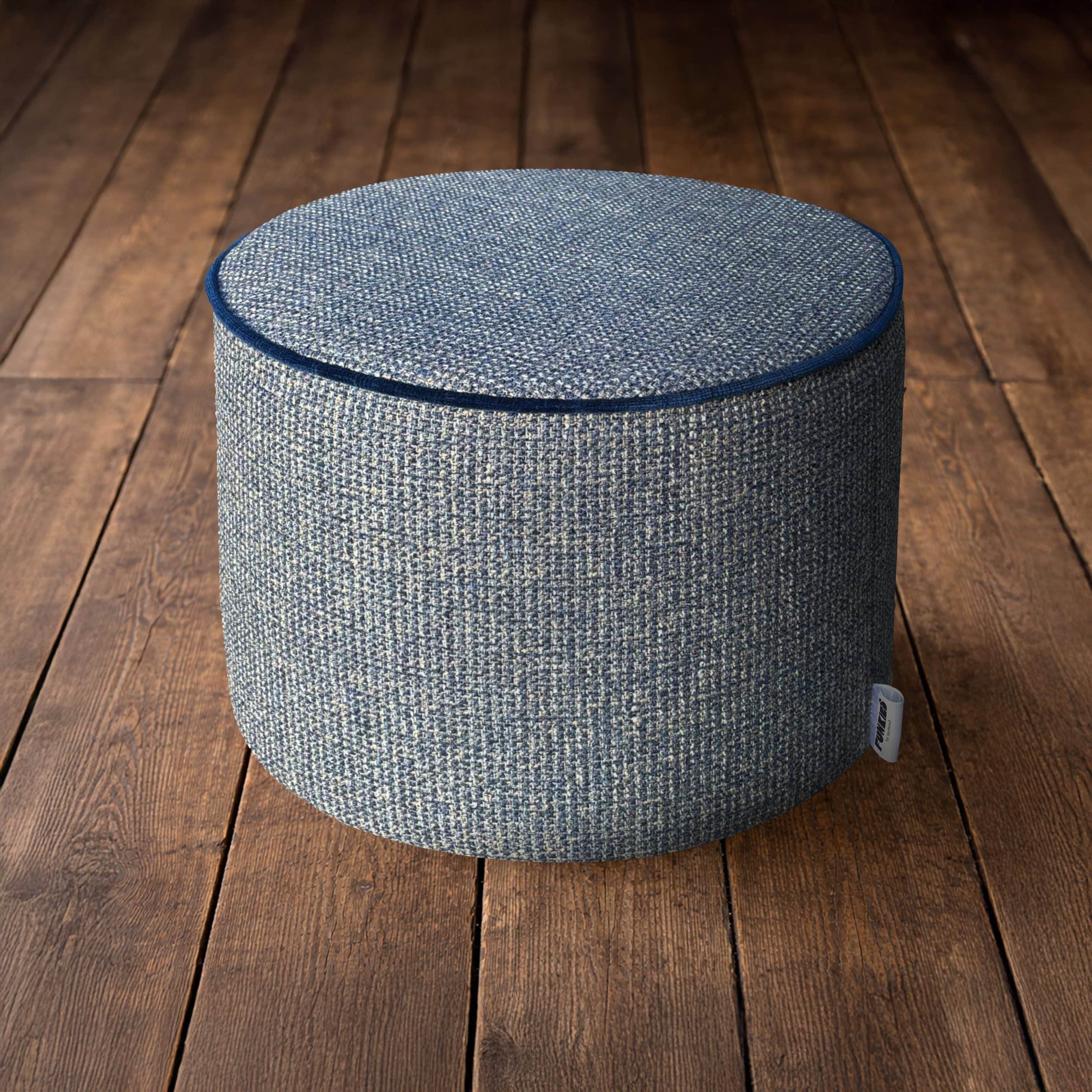 Blue Weave Funky Blue weave stool on floorboards